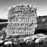 Close-up of inscription of memorial stone at Portella Della Ginestra